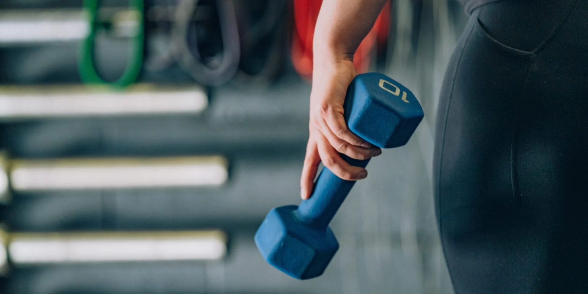 Woman with dumbbell
